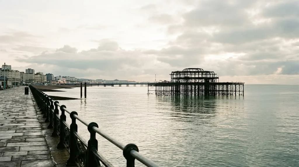 Brighton seafront and the West Pier silhouette at morning light, representing Aristral's digital marketing work for Brighton and Hove businesses